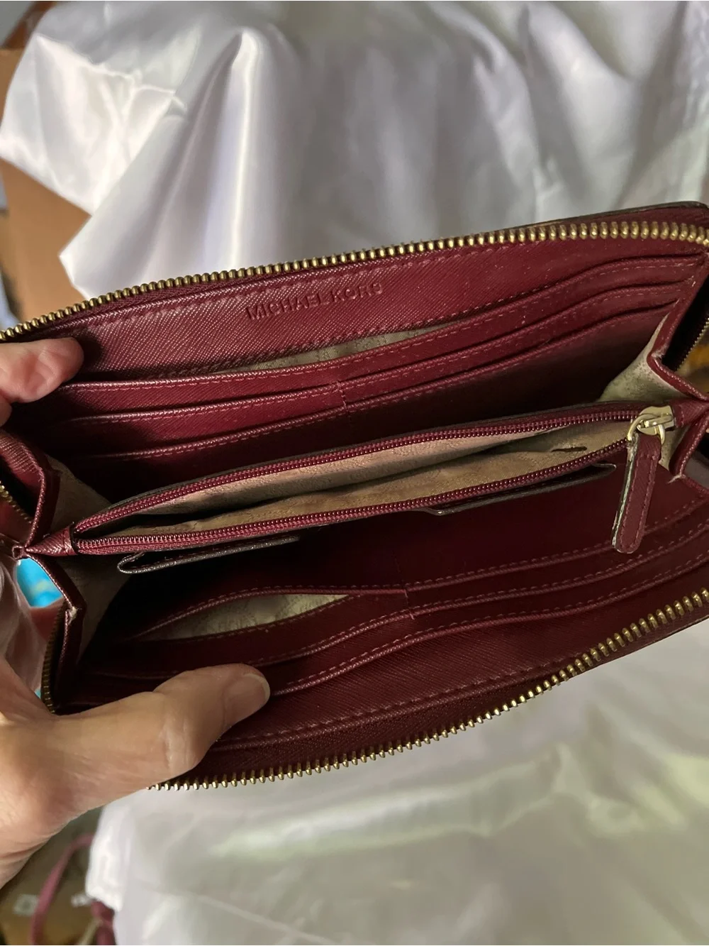 Michael Kors Maroon Saffiano Zip-Around Wallet with Gold Plaque